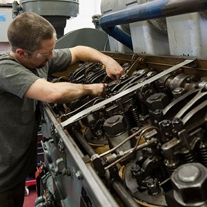 Student working on engine